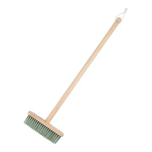 Brush with a wooden handle and green bristles on a white background