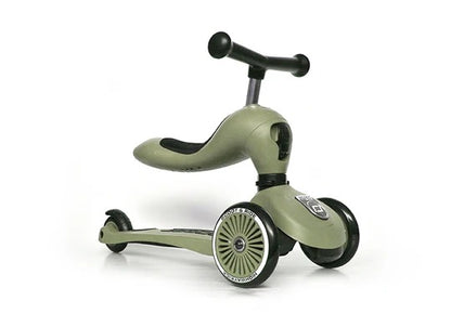 Children's balance bike with scooter attachment on a white background