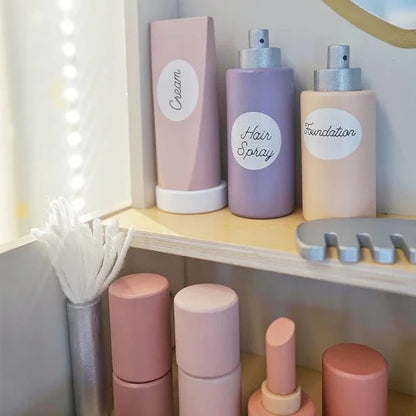 Collection of pastel-colored cosmetic bottles with labels on a shelf.