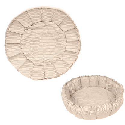 Two beige pet beds with textured fabric on a white background